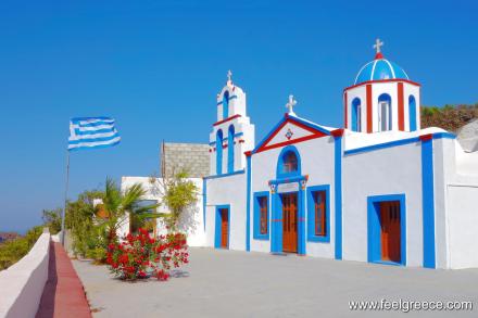 Colorful church at the background of blue sky