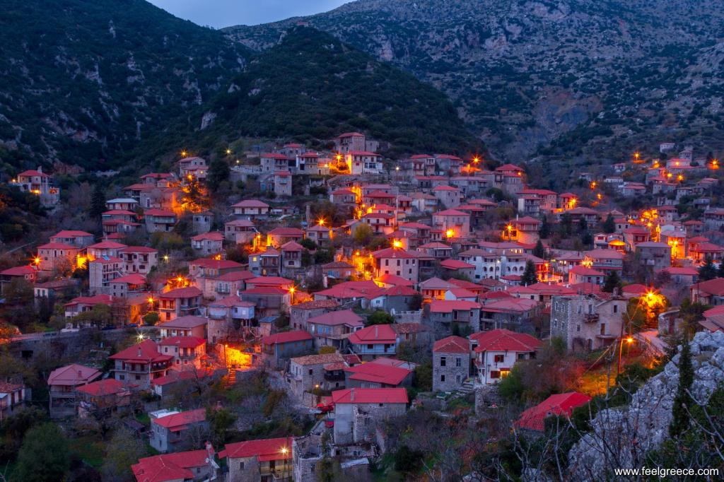 Illuminated houses of the village at night