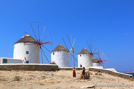 White windmills and blue sky
