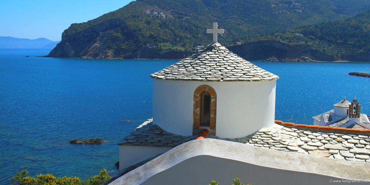 White church and blue sea
