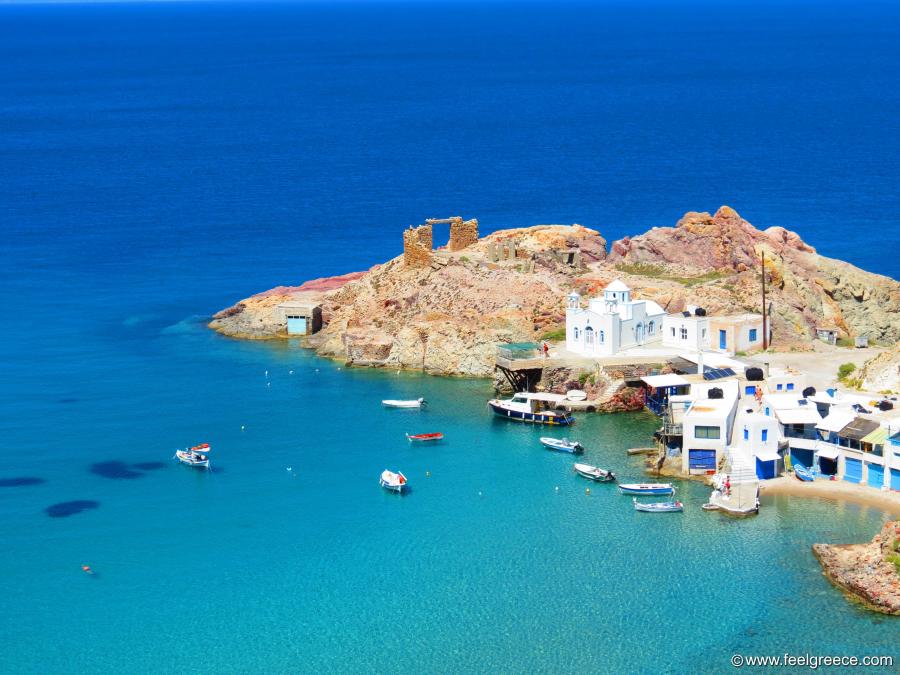 Blue sea, historical ruin, church, white houses, boats and beach
