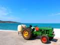 Old tractor is parked in wait for the Elafonisos ferry