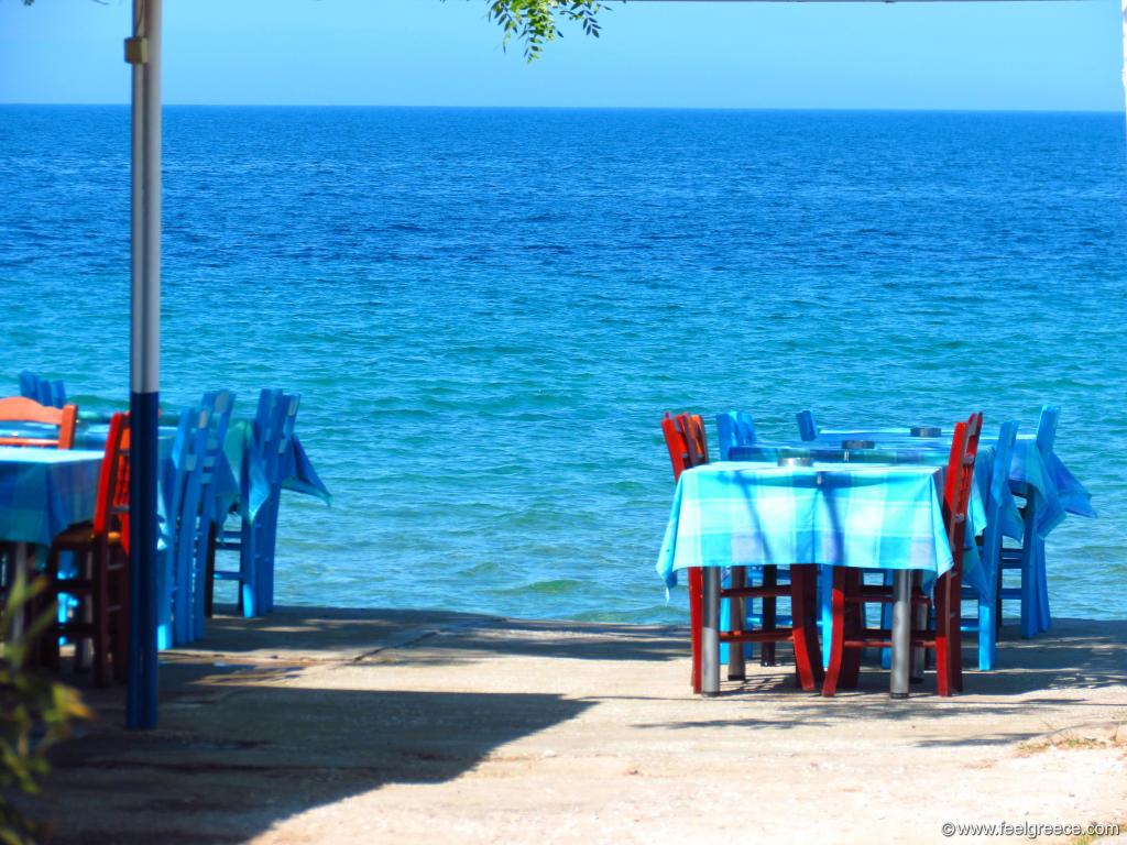 Taverna tables by the sea