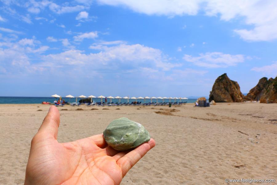 Green stone at the beach